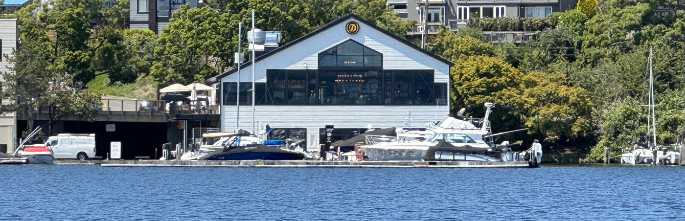 Daniel's restaurant with boats by a waterfront